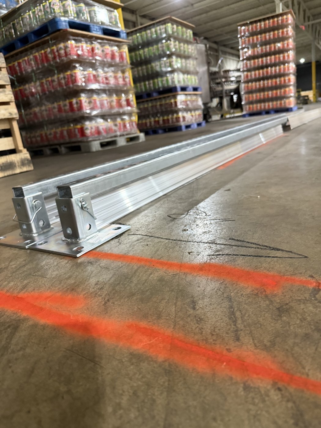 Custom rapid-strip curb forms set on the prepared slab