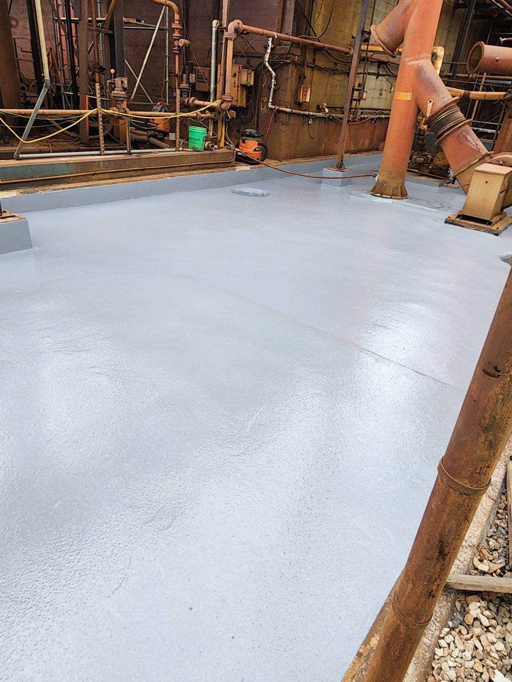 MavGrout USP and MavCrete UM containment floor with MavCoat NVE topcoat, chemical plant, Detroit — after installation