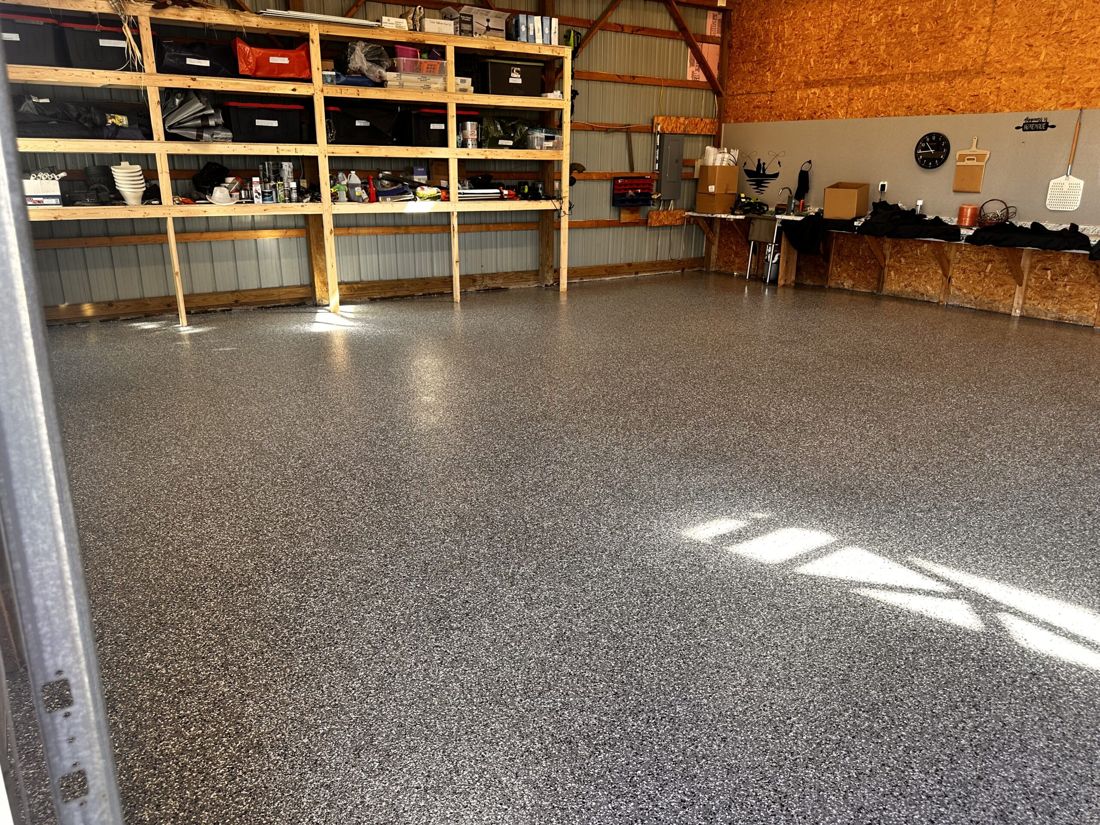 MavTop UQB quartz broadcast floor with clear topcoat, storage shed — after installation