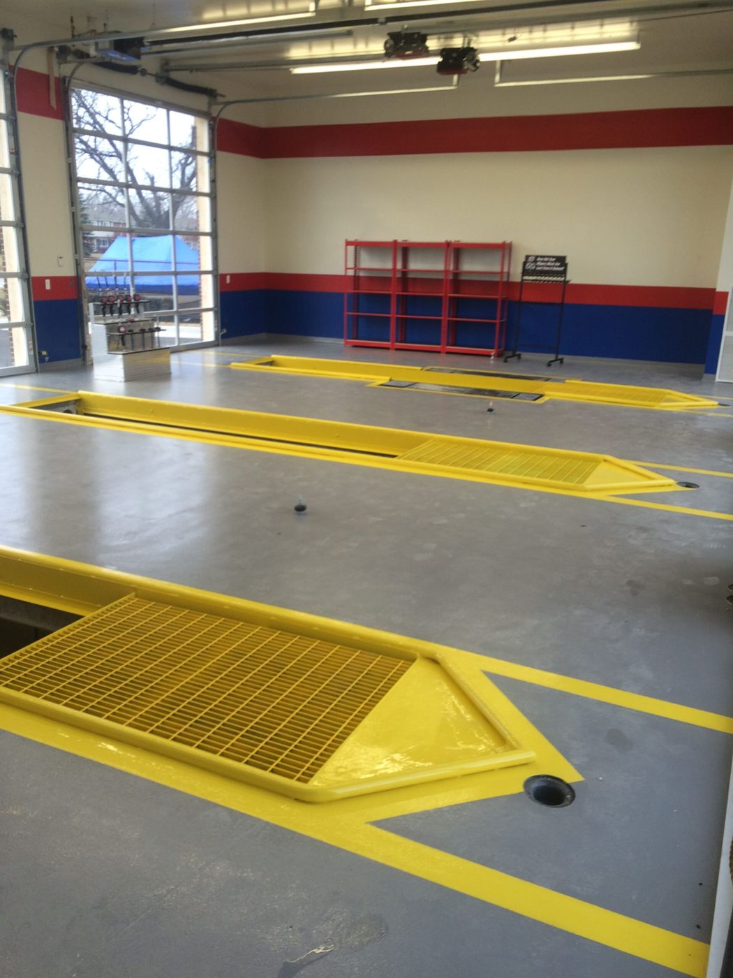 MavClad EM epoxy mortar with MavCoat SLE topcoat, oil change service bays, Taylor, Michigan — after installation