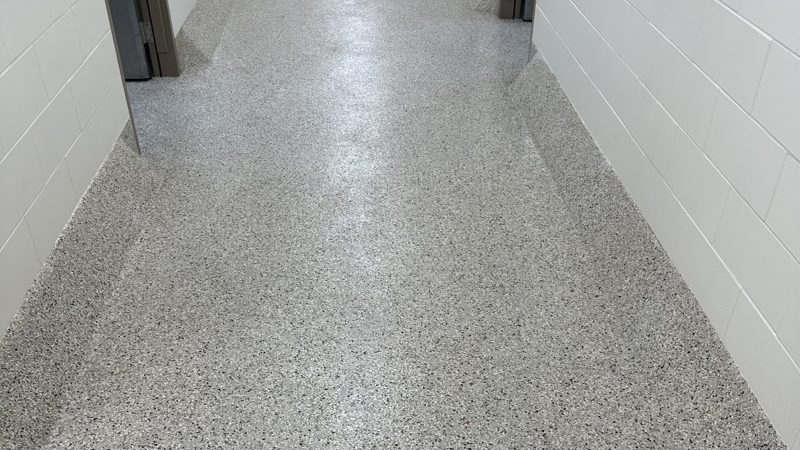 Vivarium corridor with seamless coved flooring