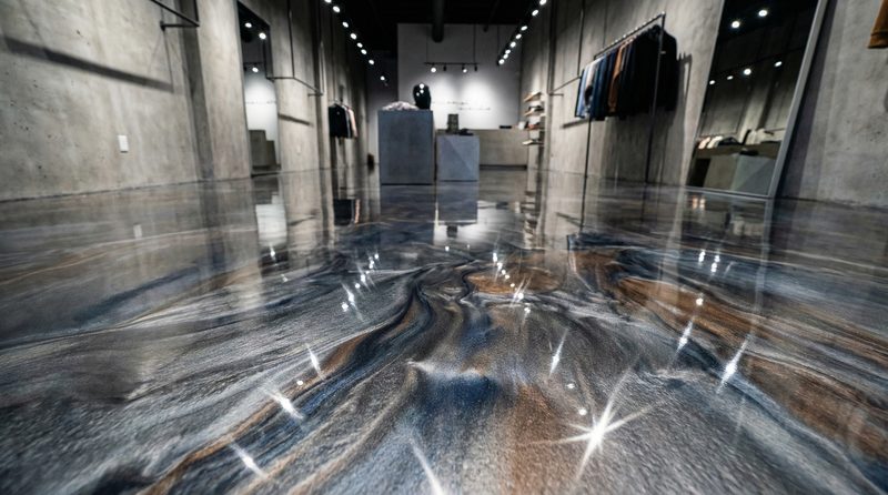 Retail showroom with decorative high-gloss metallic epoxy floor