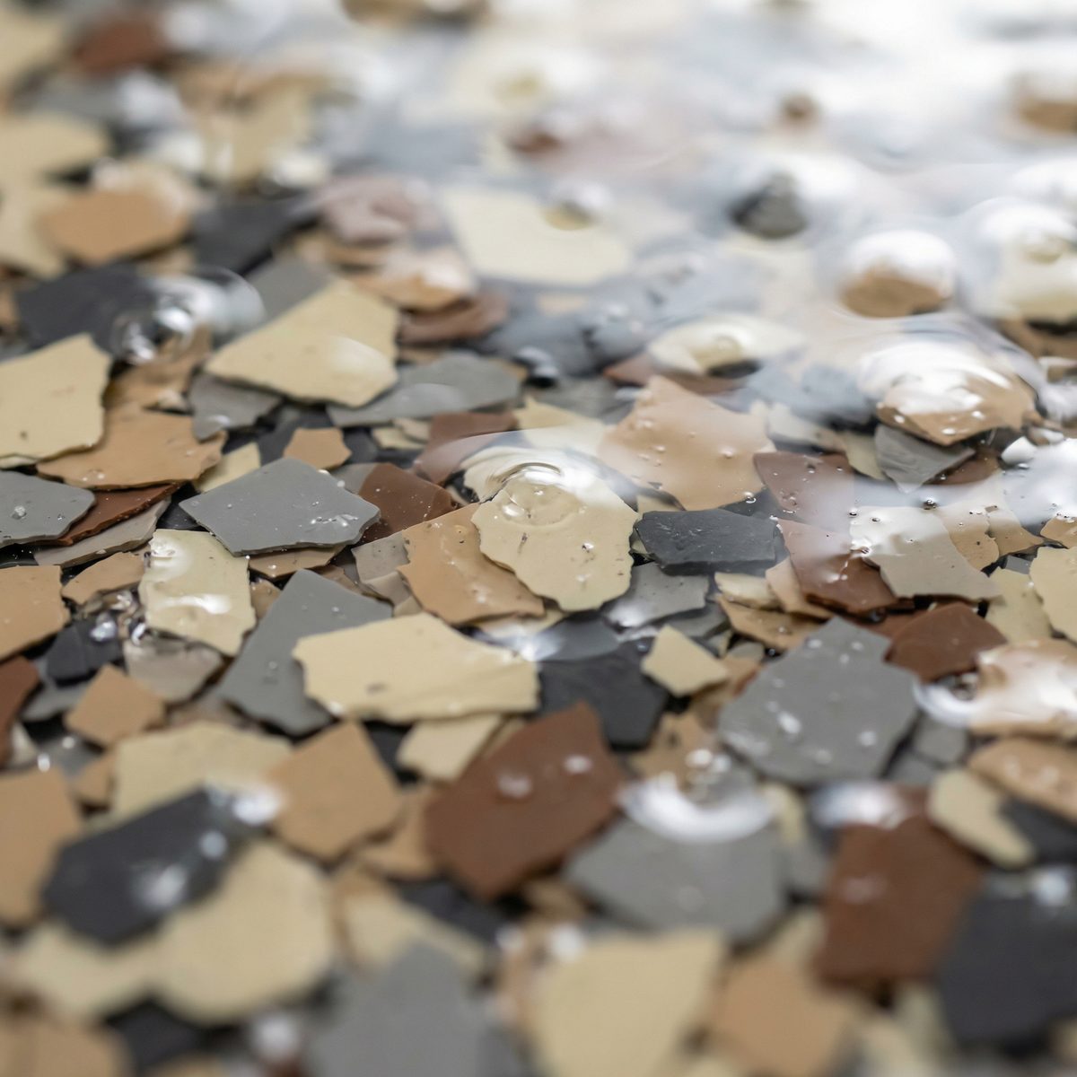 Macro view of vinyl flake broadcast media in blended earth tones